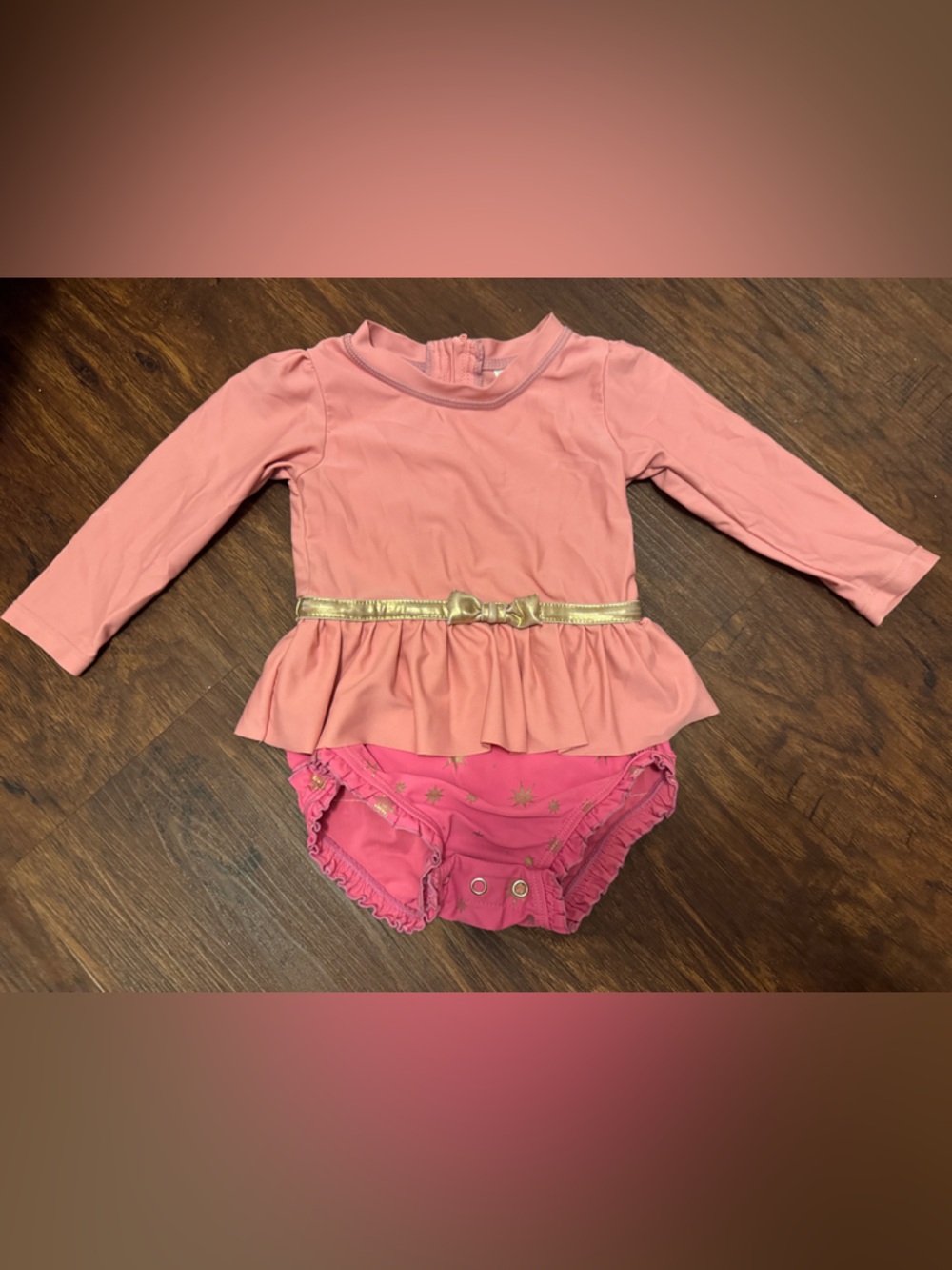 Ruffle Butts Pink Long Sleeve Peplum One-Piece with Gold Belt- Princess Aurora